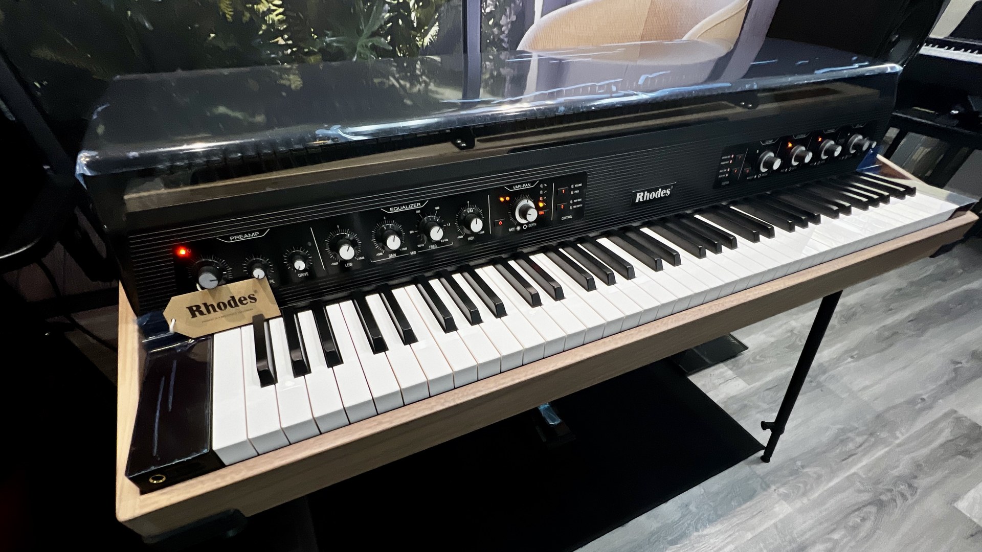 Rhodes MK8 Deluxe showing walnut case and full analog effects panel