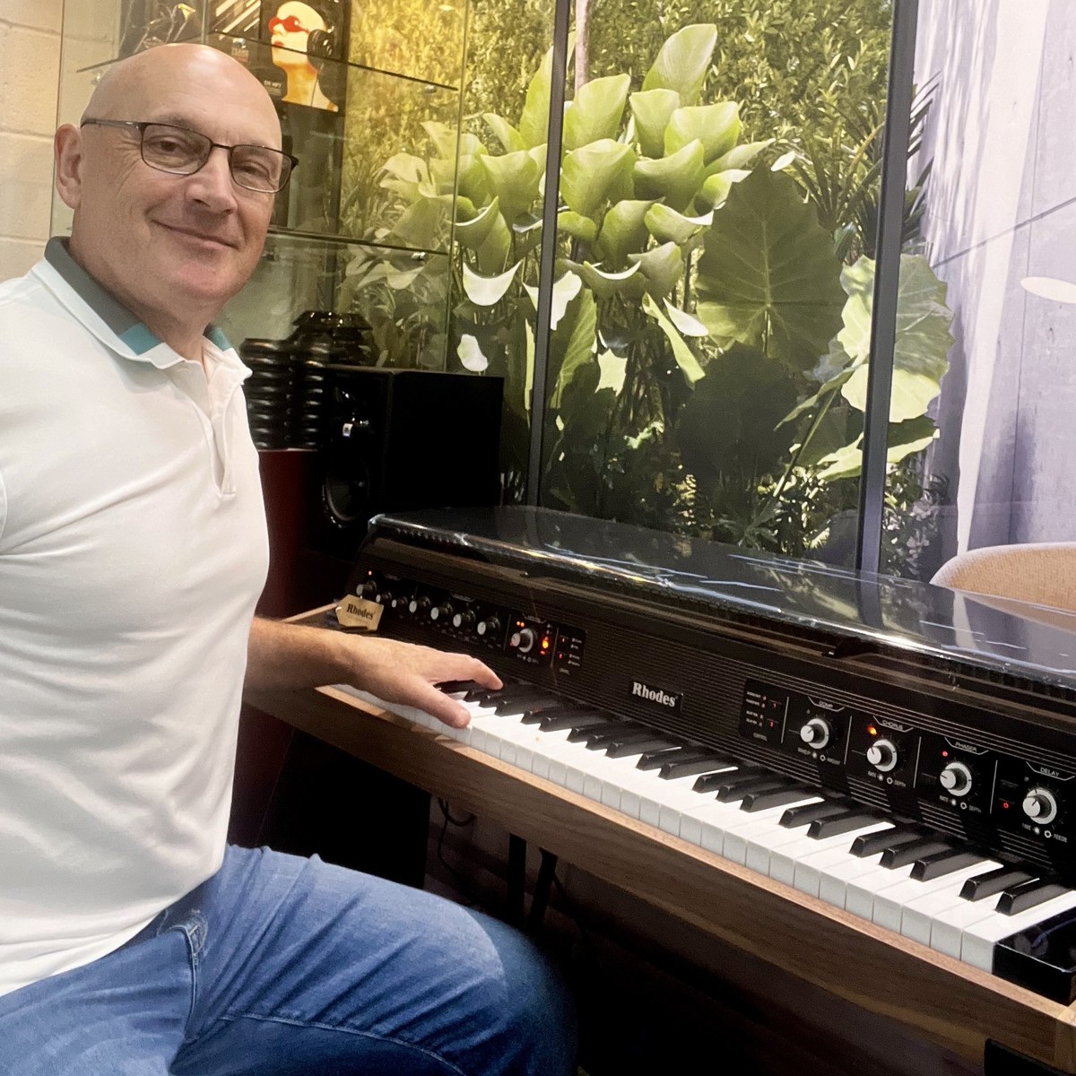 Pierre seated at a Rhodes MK8 Deluxe in his Los Angeles showroom
